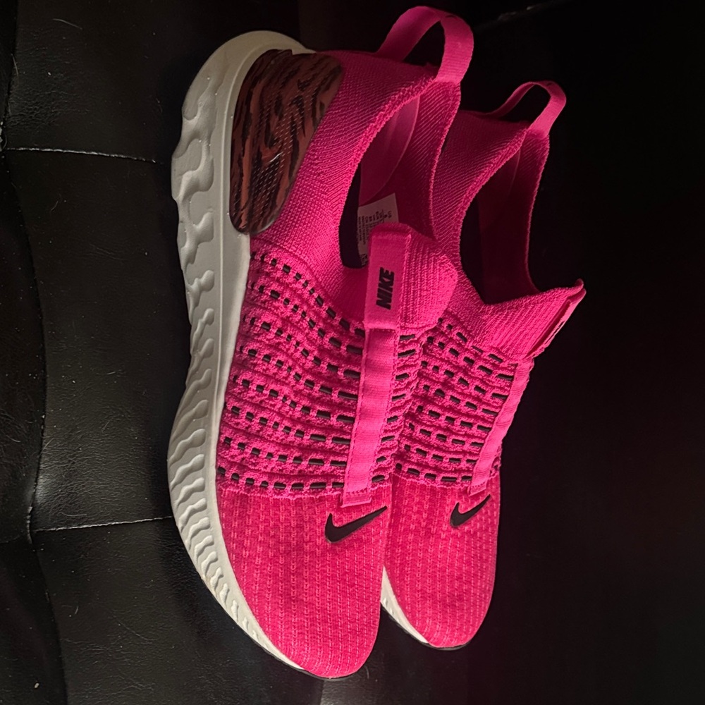 Nike Women's Vibrant Pink Slip-On Sneakers